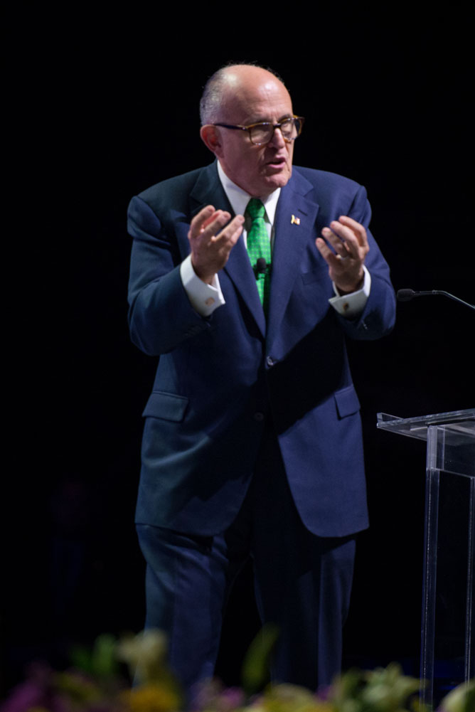 Former NYC Mayor Rudy Giuliani speaks on stage at the County Family Gathering