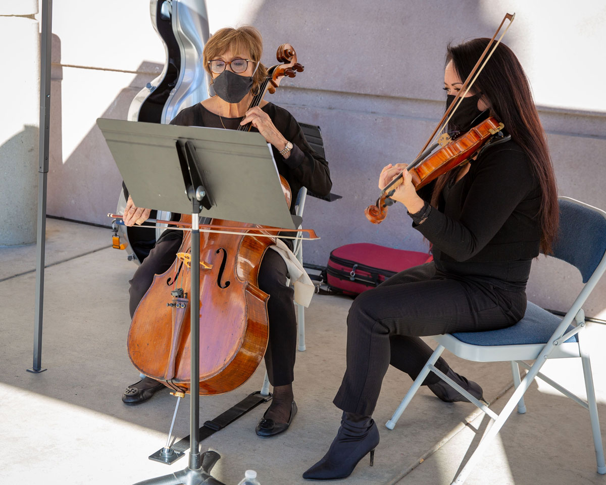 Otherwise Strings violinist performs at the Curtain of Courage Memorial Concept Unveiling