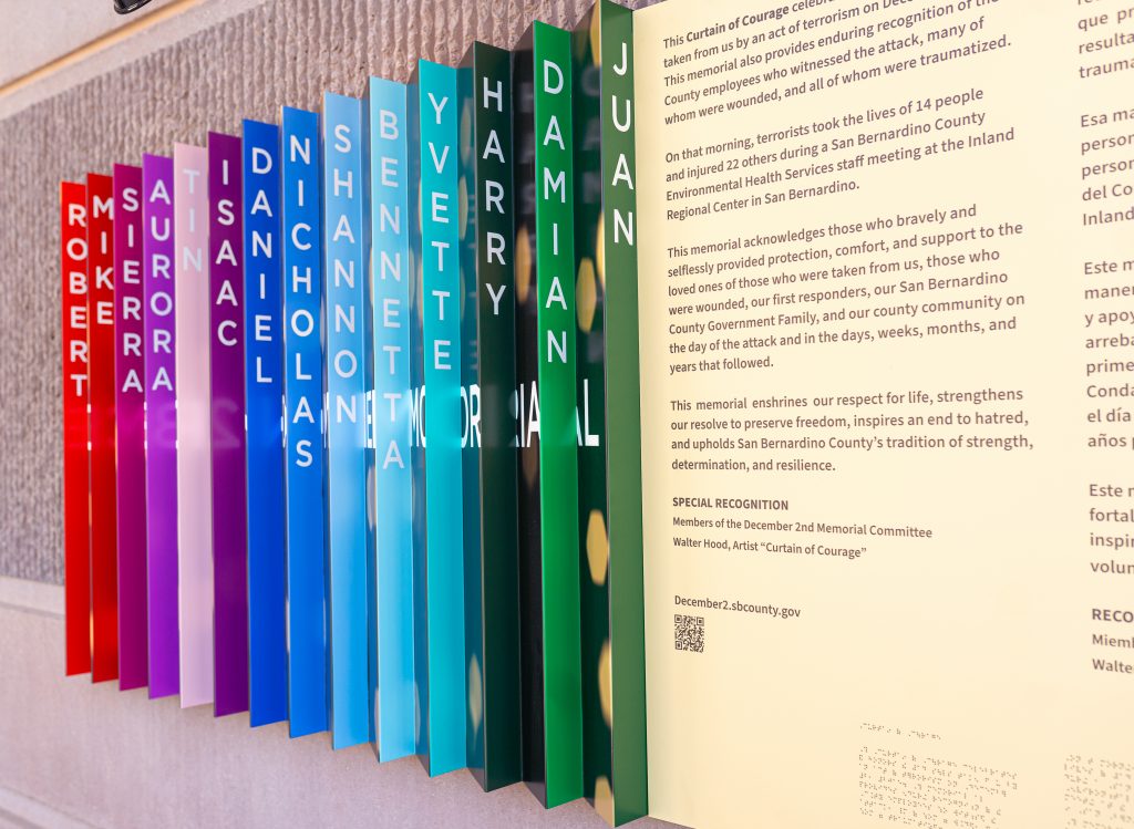 Names of 14 victims of the December 2, 2015 terrorist attack outside the Government Center on a colorful plaque